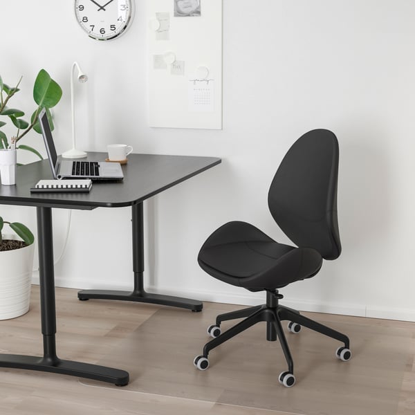 A Smidig black HATTEFJÄLL office chair and business 