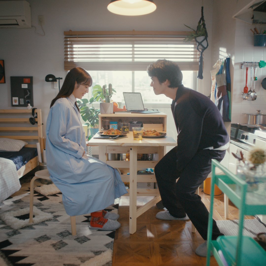 Dining scene in kitchen with pasta dishes on the table