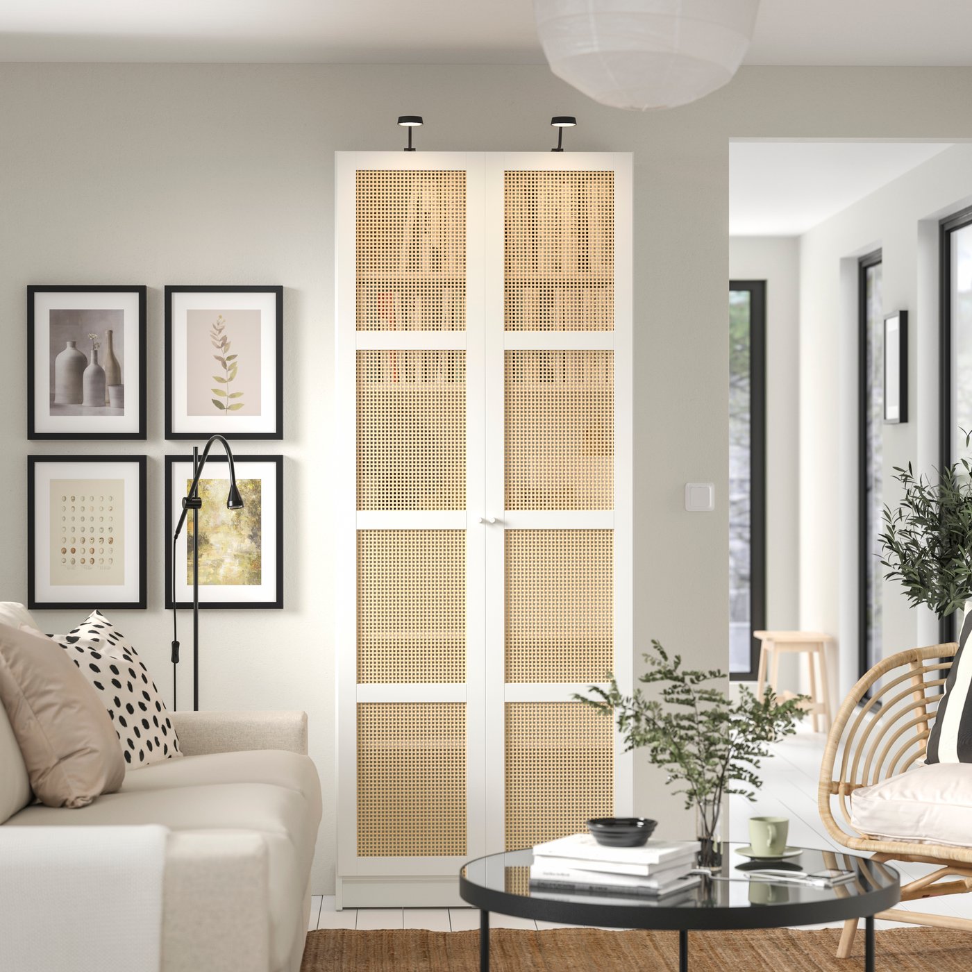 A white BILLY bookcase with doors in the living room