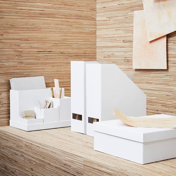 A white TJENA magazine file in the home office