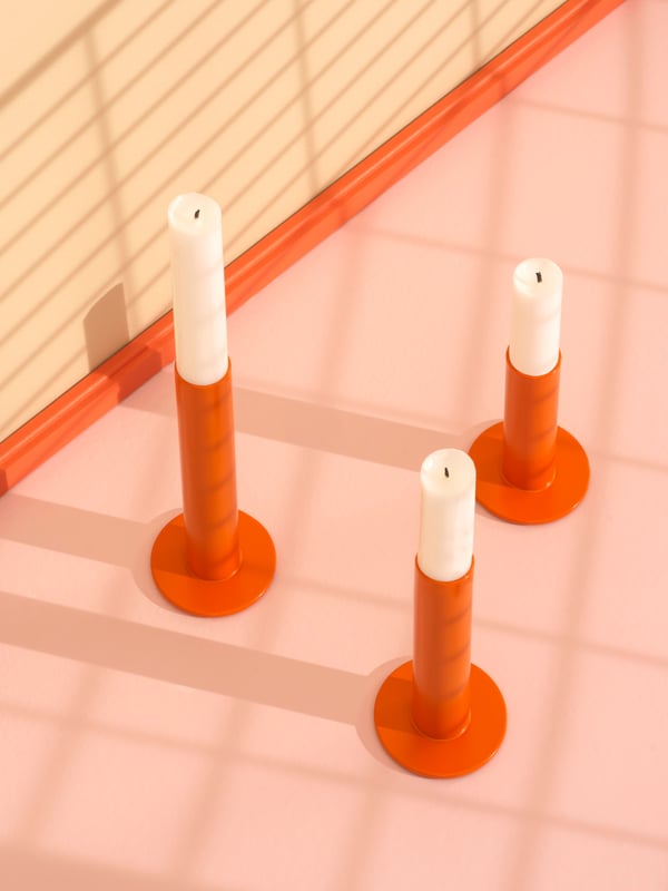 Kerzenständer in der Trendfarbe Orange.