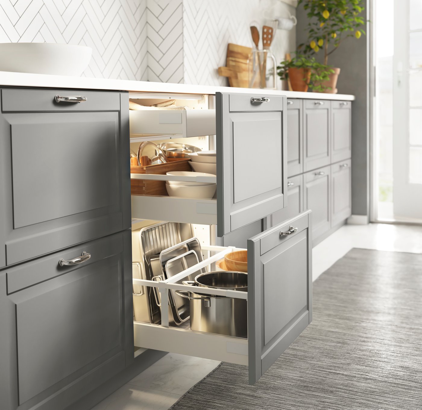 A white Maximera/Bodbyn grey SEKTION base cab with 2 fronts/3 drawers