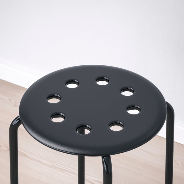 A black MARIUS stool in the NA