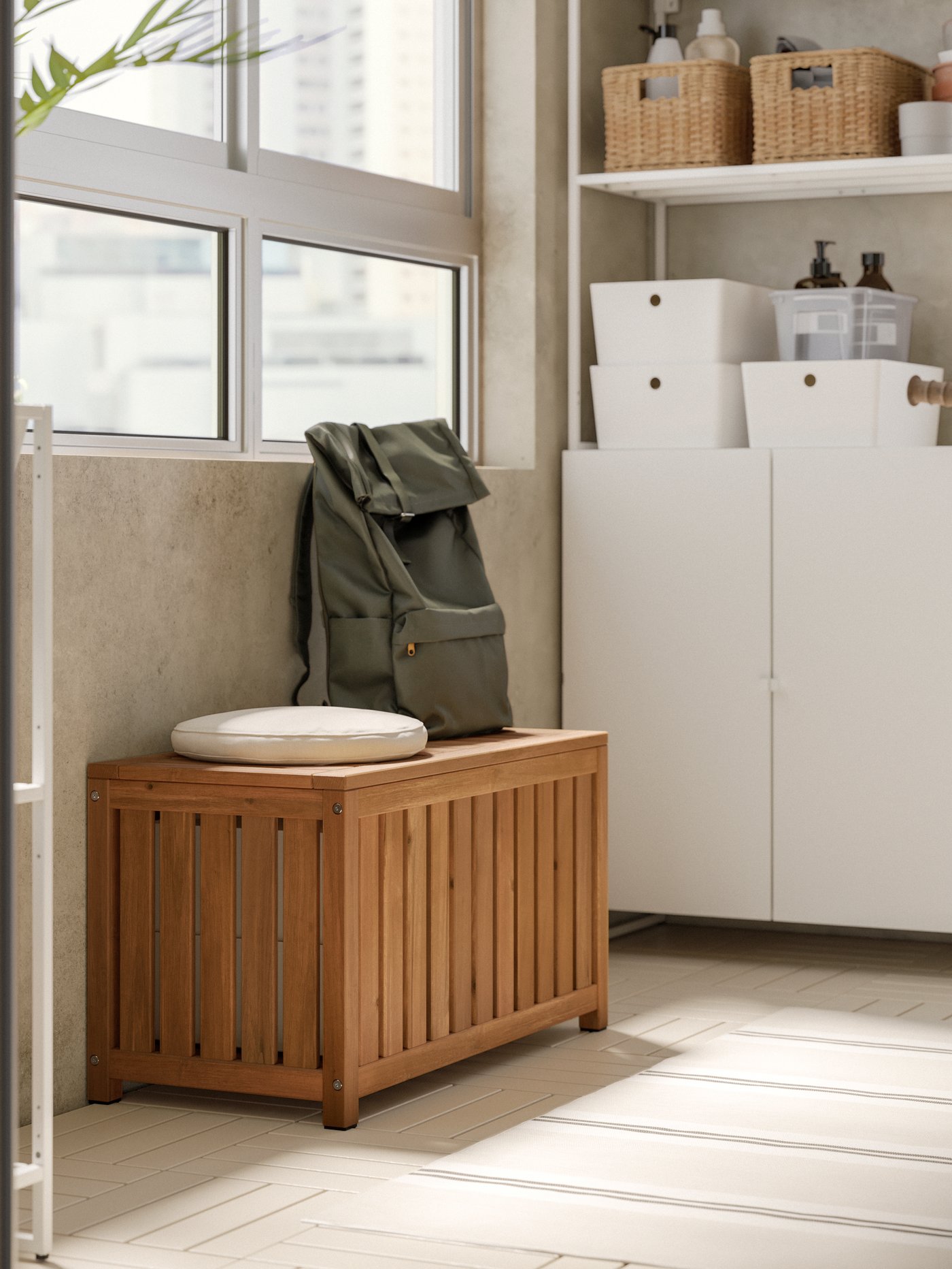 A light brown stained indoor /outdoor NÄMMARÖ storage box