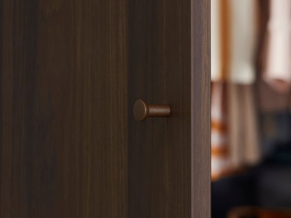 A white/oak effect PAX wardrobe combination