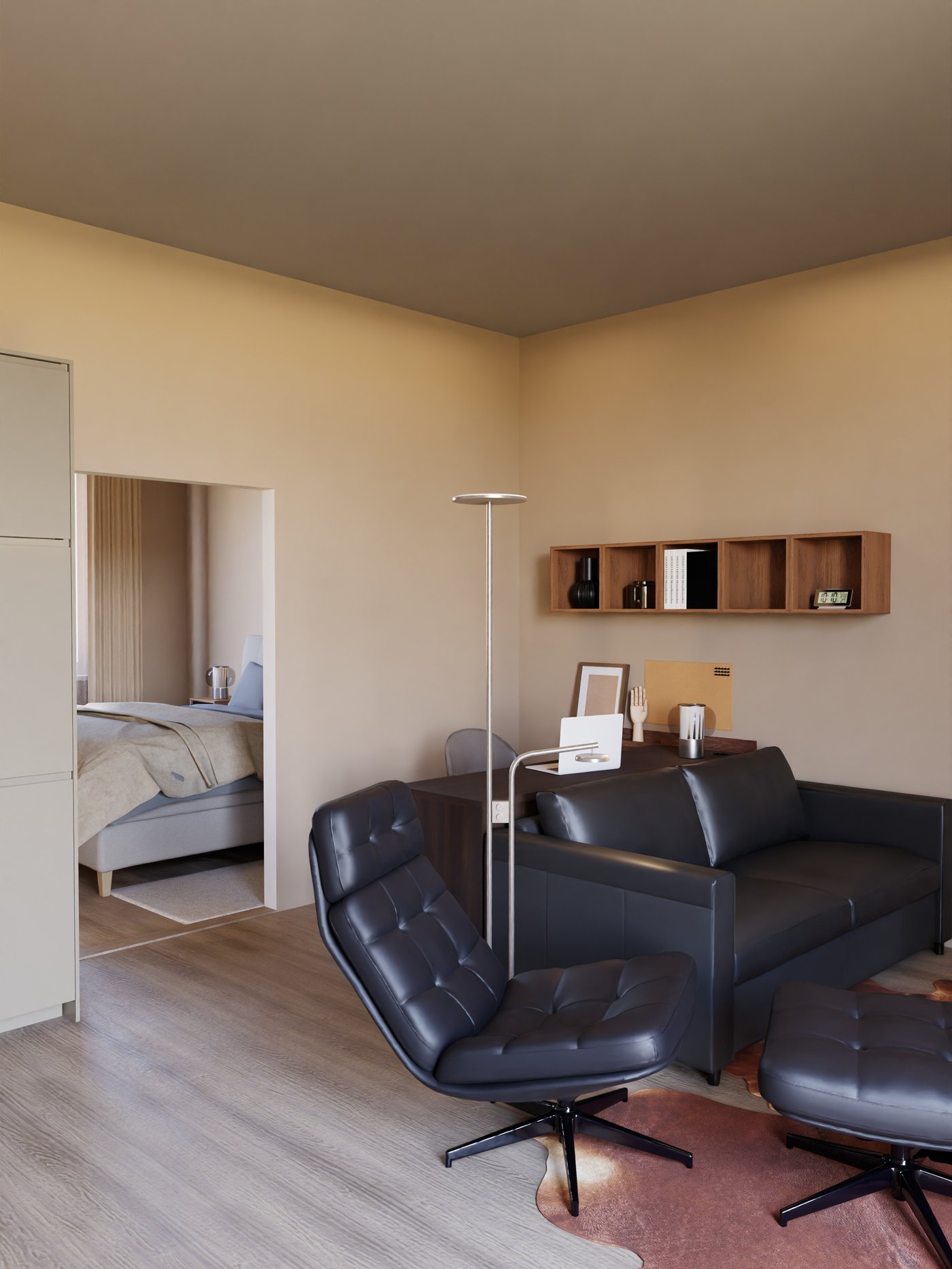 Ledersessel und Ledersofa mit Blick ins Schlafzimmer