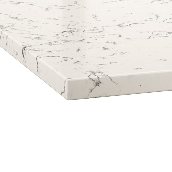 Close-up of a white marble-look countertop with bold black veining and a smooth, polished finish.