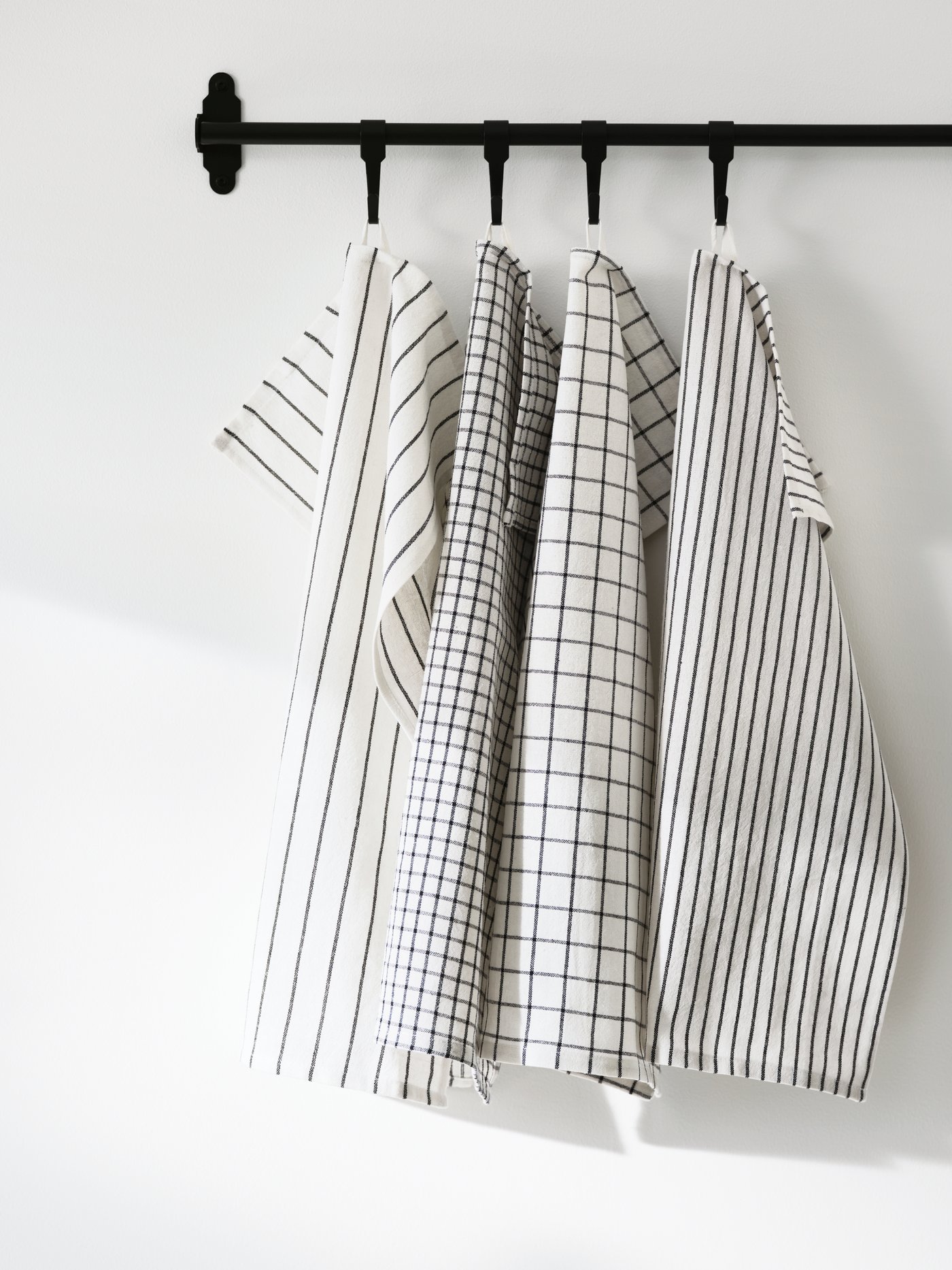 A black HULTARP hook in the kitchen