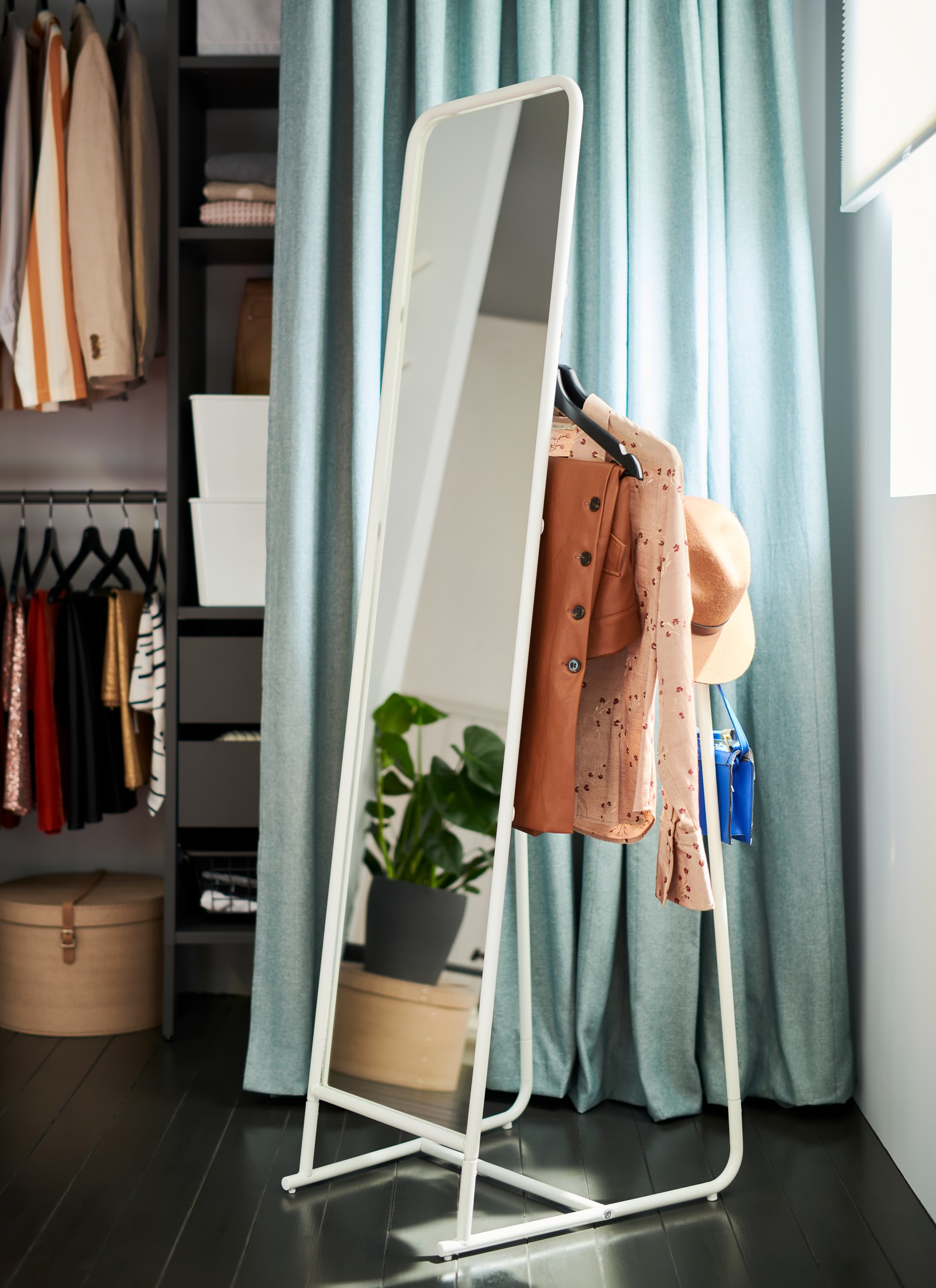 A white KNAPPER standing mirror