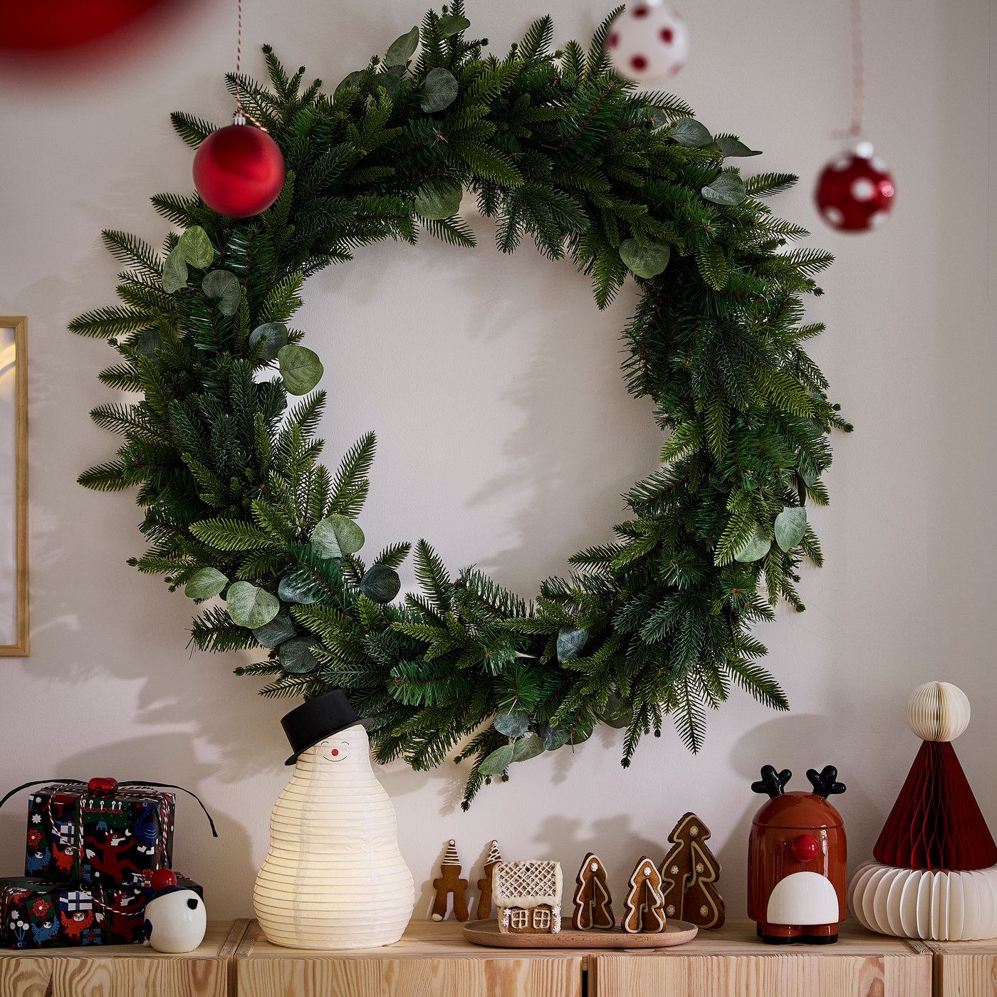 A green VINTERFINT artificial wreath for indoor/outdoor use