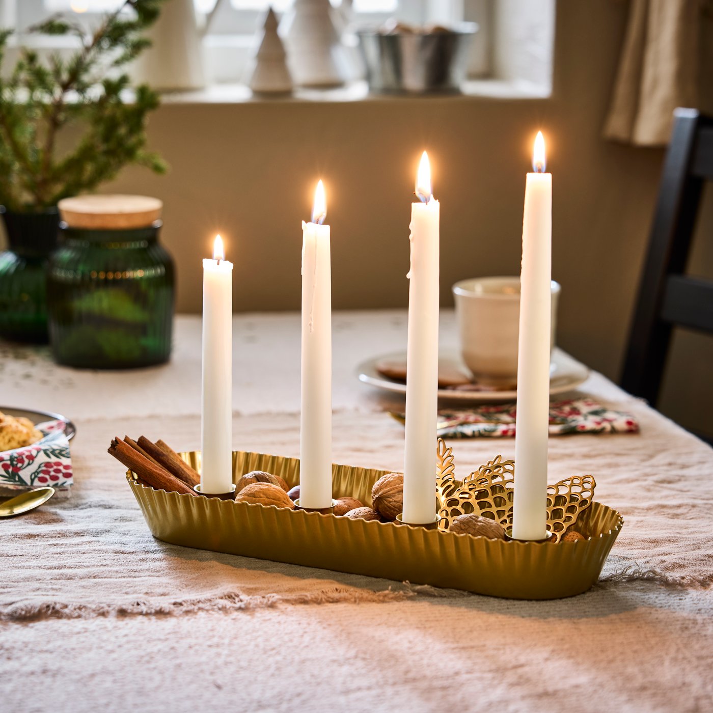 Et hvitt VINTERFINT uparfymert stearinlys.