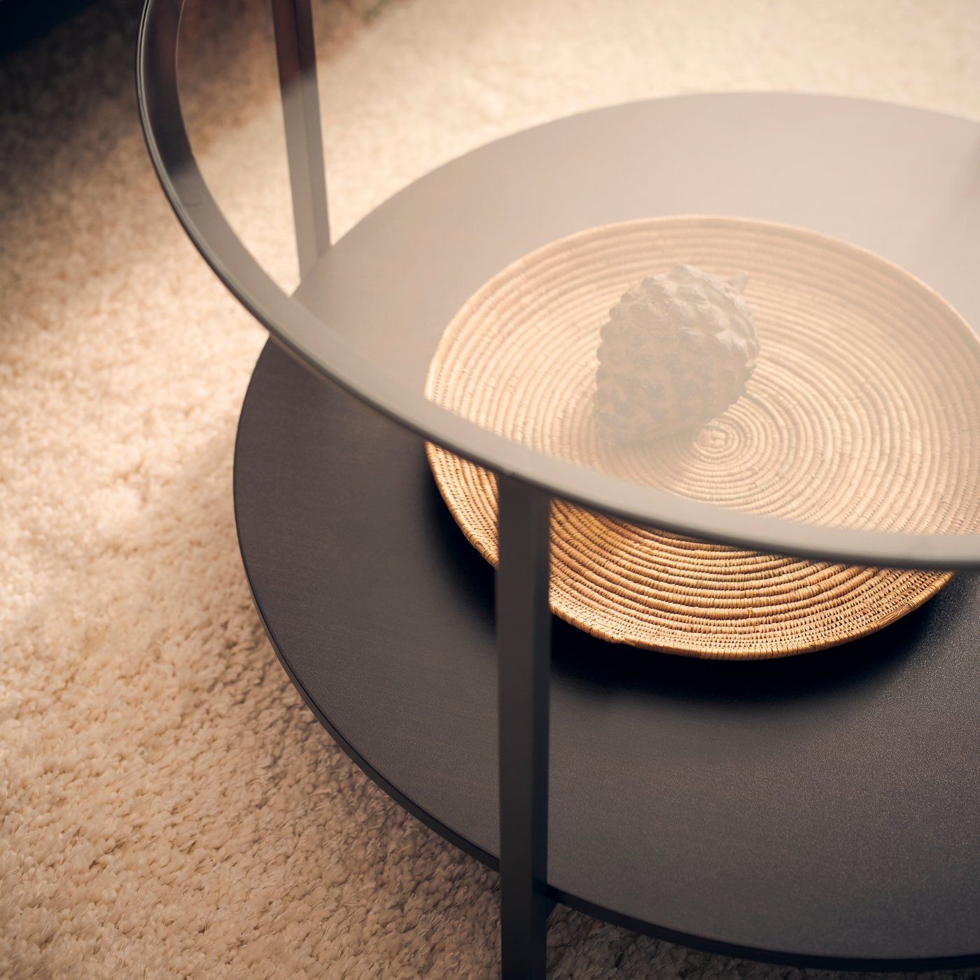 A black-brown/glass VITTSJÖ coffee table