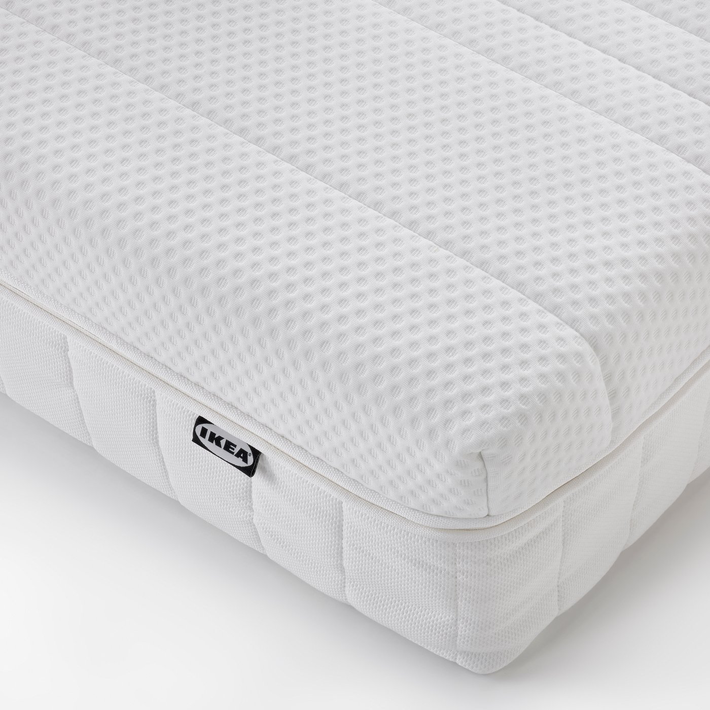 A medium firm/white ÅNNELAND hybrid mattress