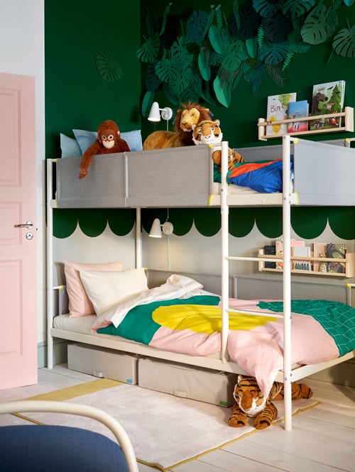 Bedroom with bunk bedframe, wall lamp, wall storage shelf, jungle pattern on wall, quilt cover and pillowcase set, soft toys.