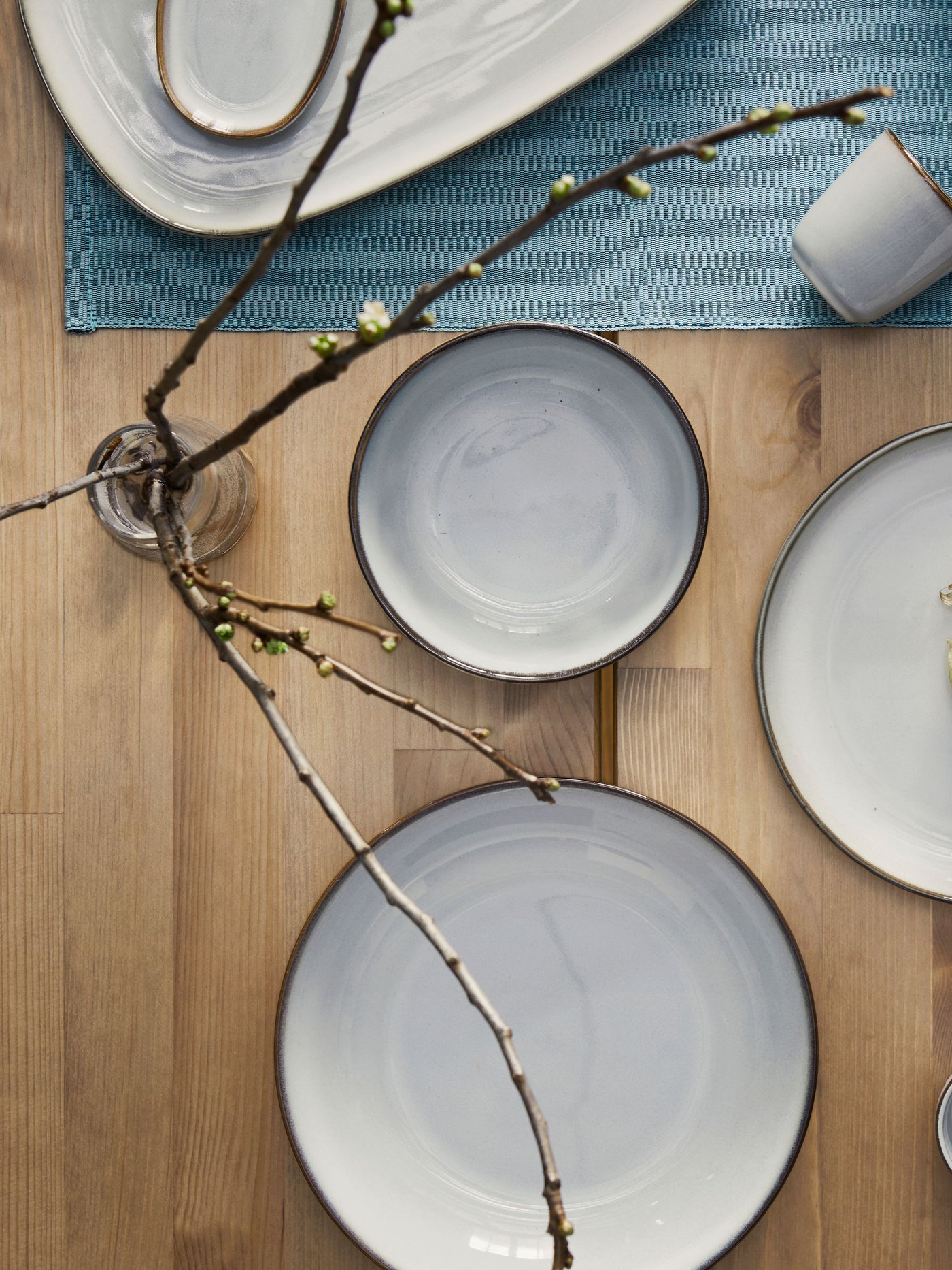 A grey GLADELIG deep plate