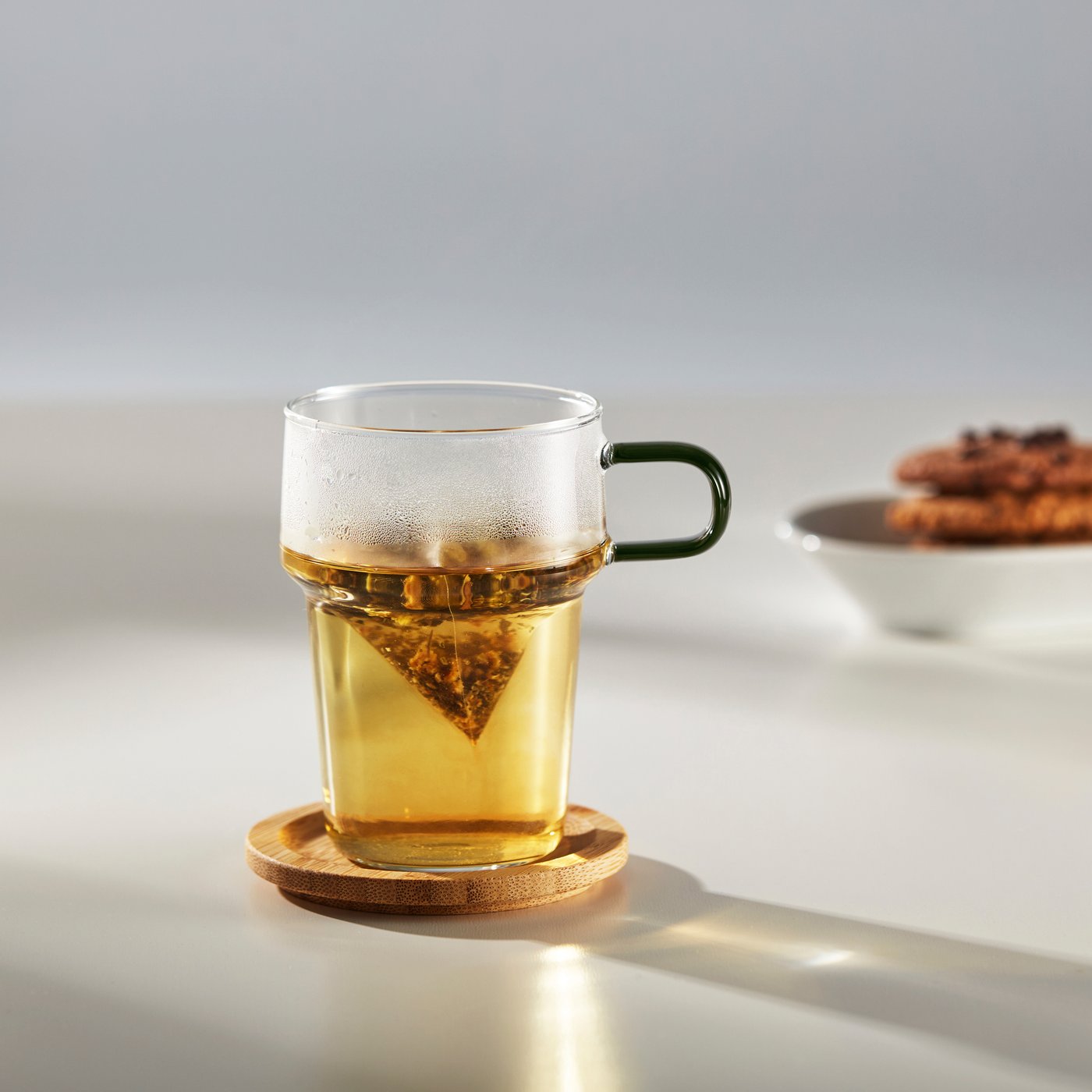 A clear glass SKINNFISK glass with handle