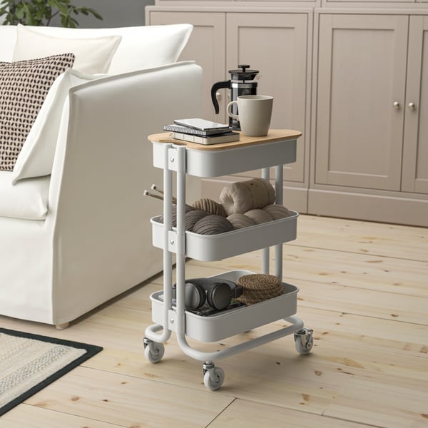 A white RÅSKOG trolley