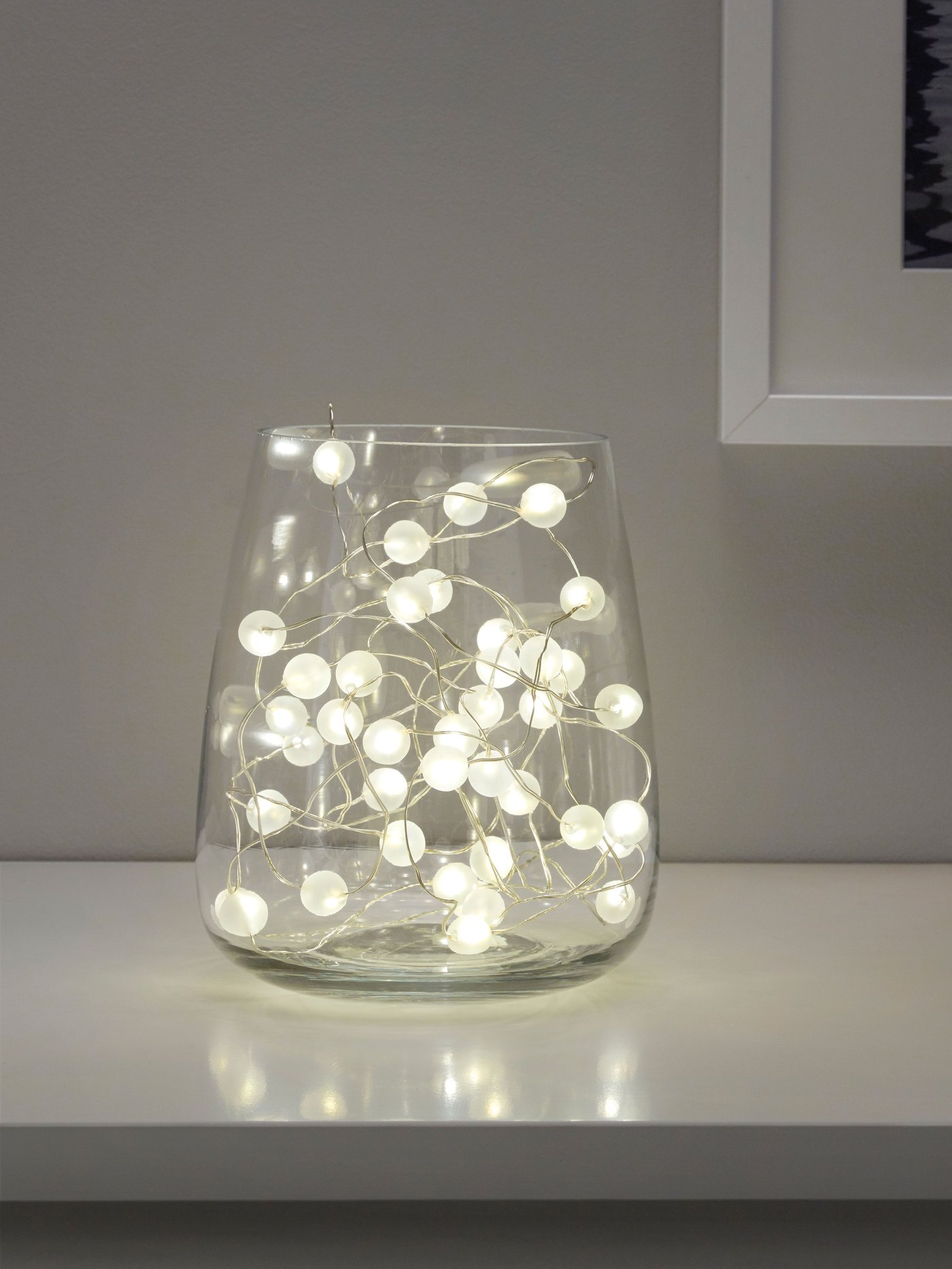 An indoor/battery-operated silver-colour SNÖYRA LED lighting chain with 40 lights