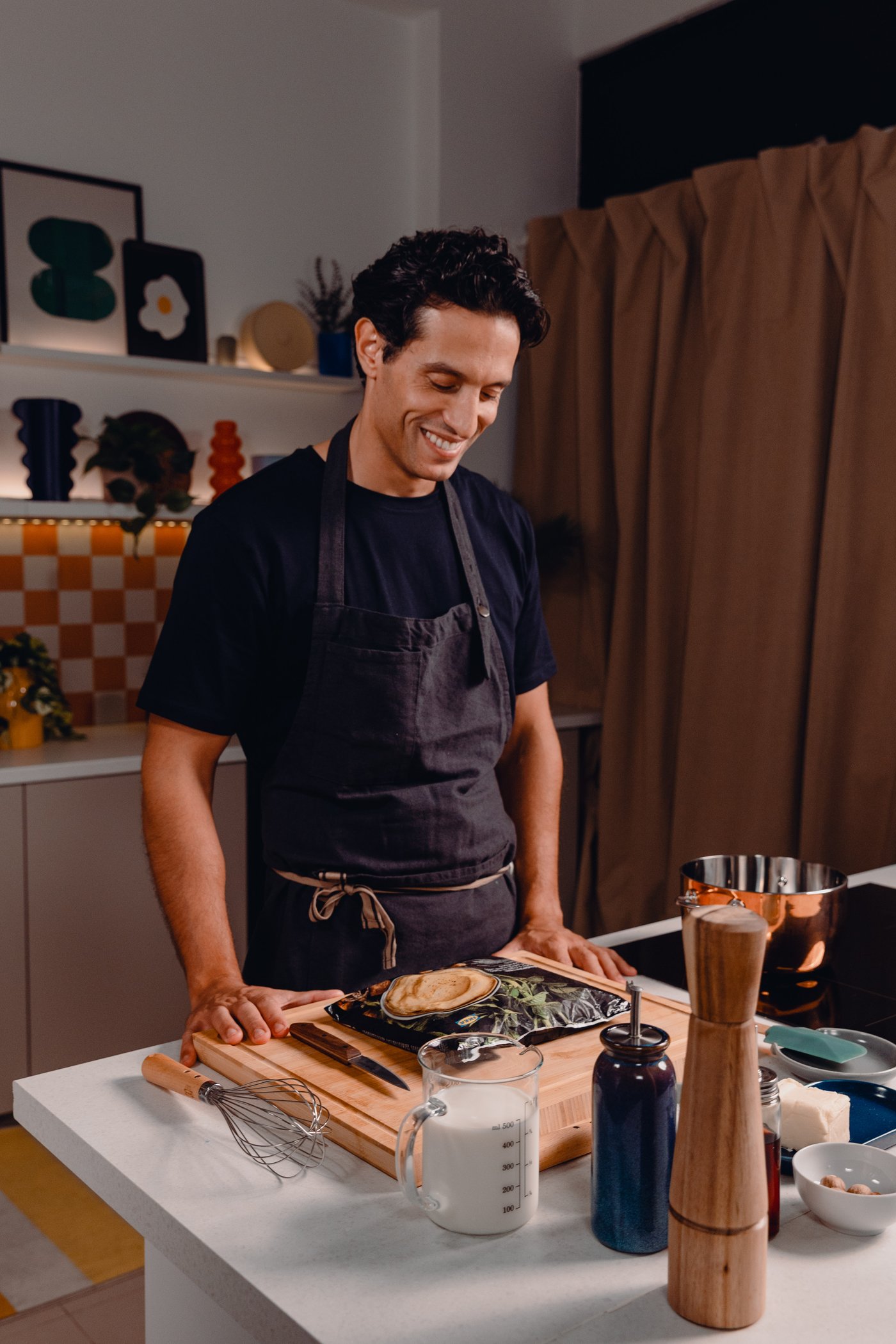 Chef Carlos Afonso preparing pork knuckle with mashed potatoes