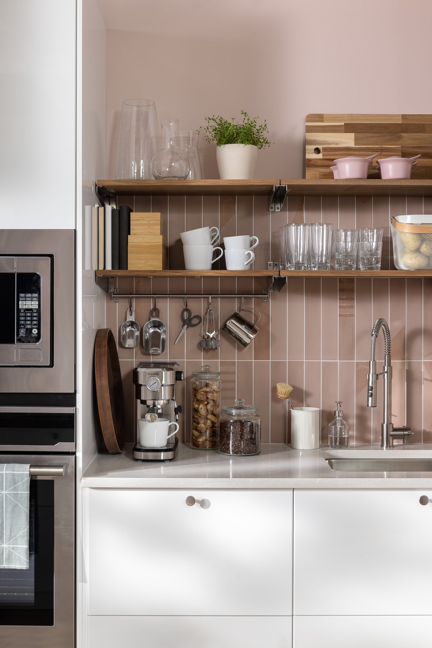A clear glass VARDAGEN jar with lid