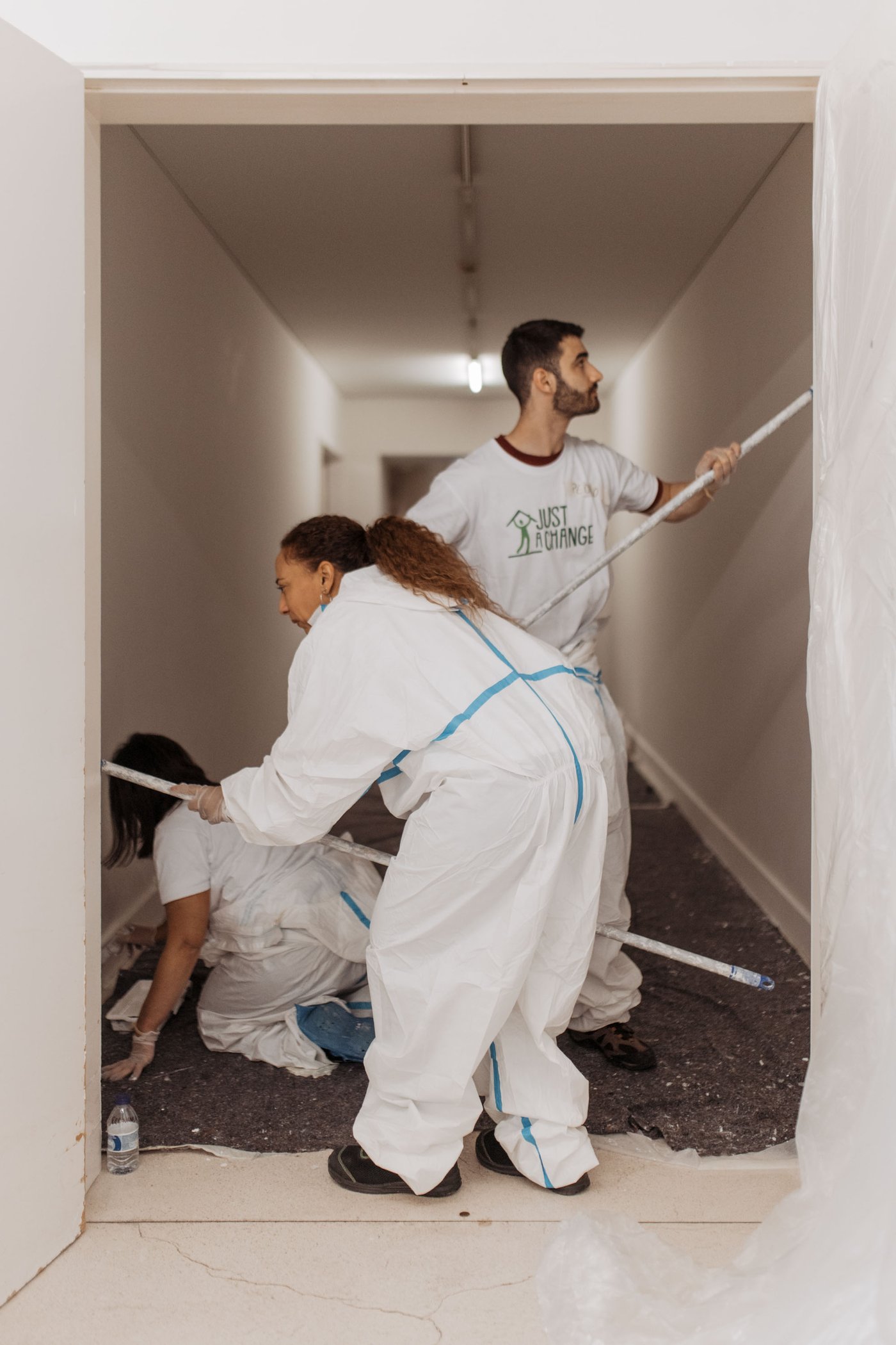 People painting walls