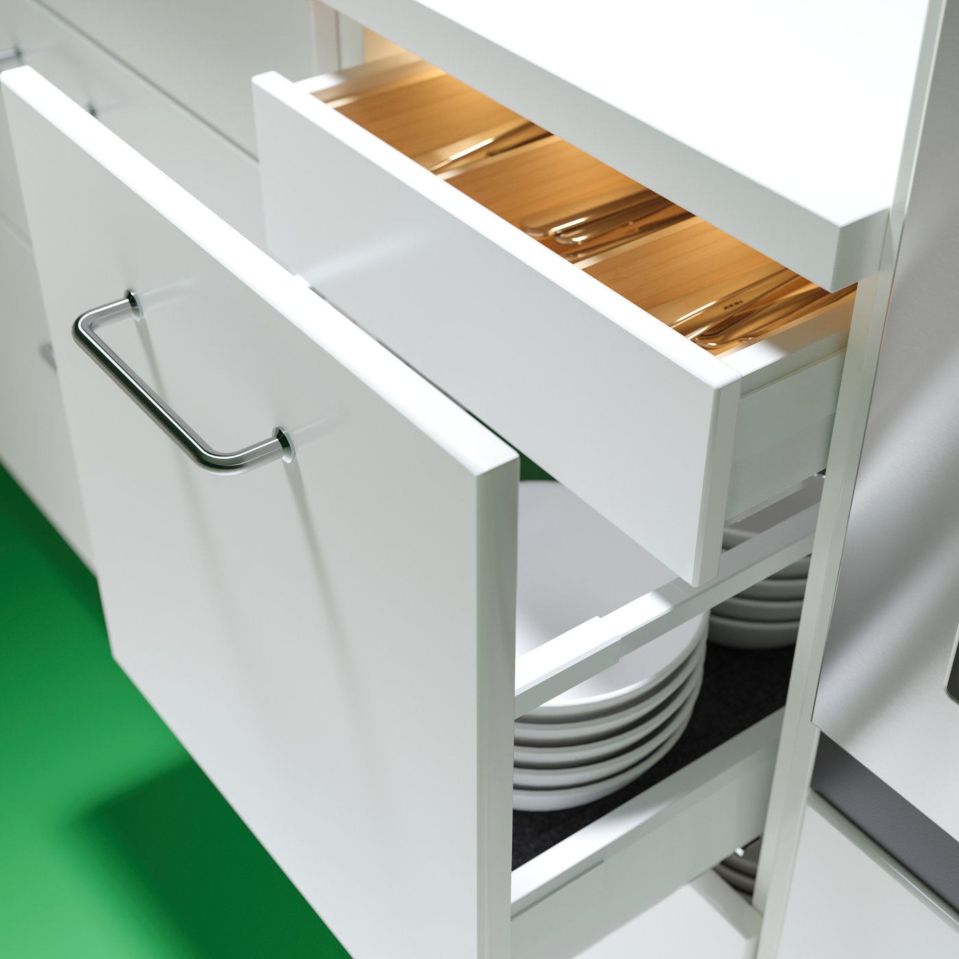 Tiroir d’armoire inférieure SEKTION ouvert sur plusieurs tiroirs intérieurs, cachés derrière la façade.