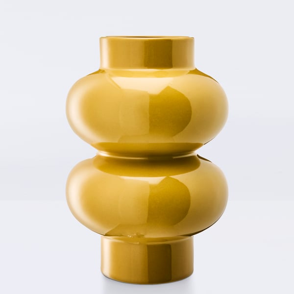 A yellow-beige PÄRLHÄGG vase with a rounded, elegant silhouette, showcasing its smooth glossy finish.