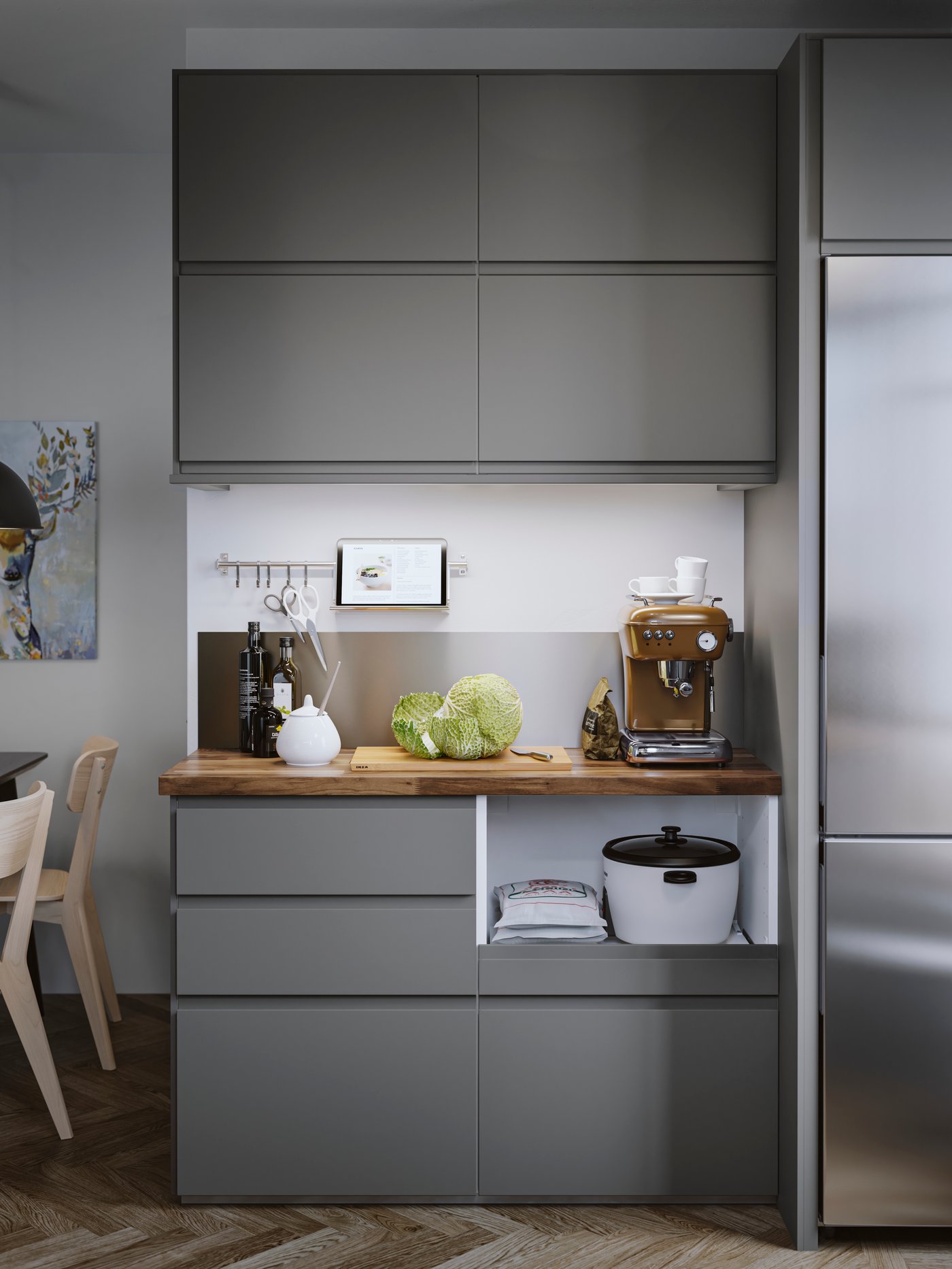 A dark grey VOXTORP drawer front