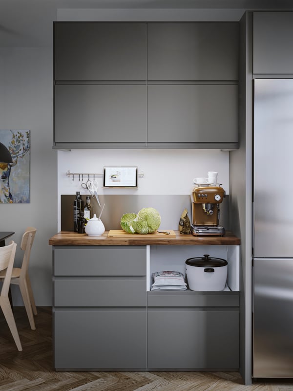 METOD kitchen front with grey cupboards, coffee maker and other small appliances