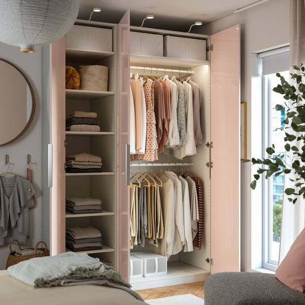 A white/high-gloss light orange FARDAL wardrobe combination