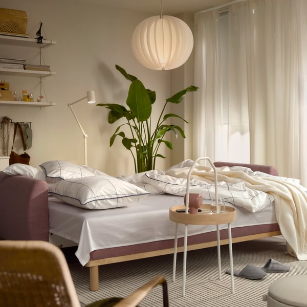 A Gunnared light brown-pink GRUNNARP 3-seat sofa-bed