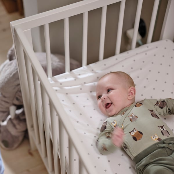 A white GULLIVER cot