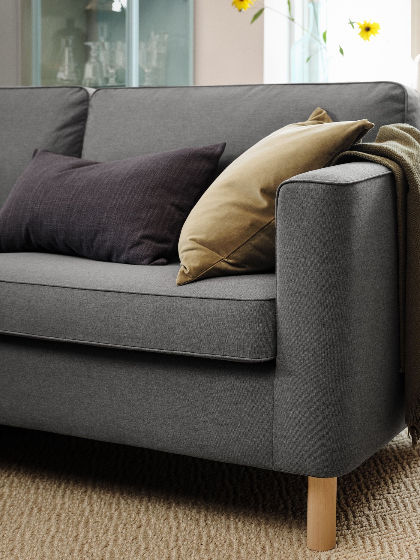 A grey PÄRUP 3-seat sofa in the living room.