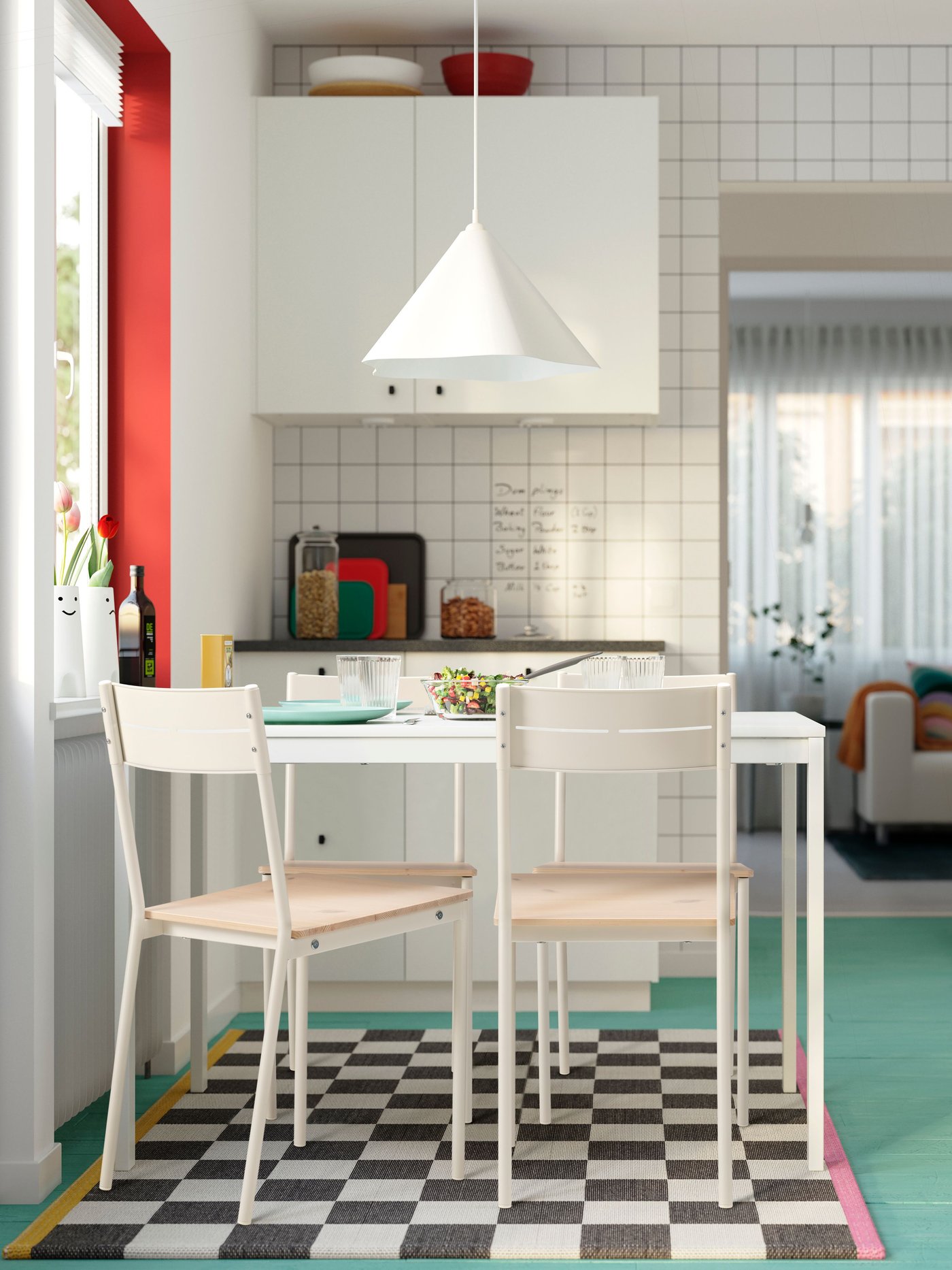 A white/pine BUSLÄTT chair in the dining room