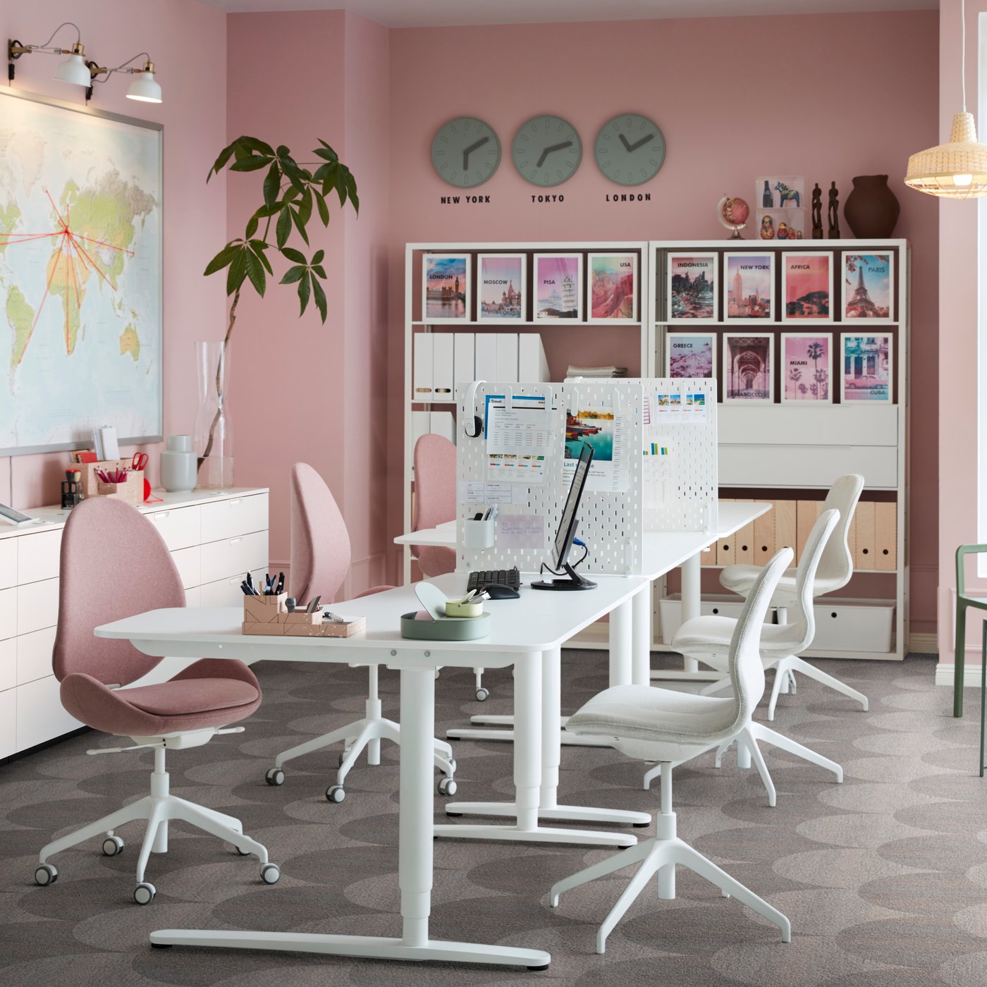 An UTESPELARE gaming chair and desk surrounded by a white PLATSA storage combination holding gaming and other accessories.