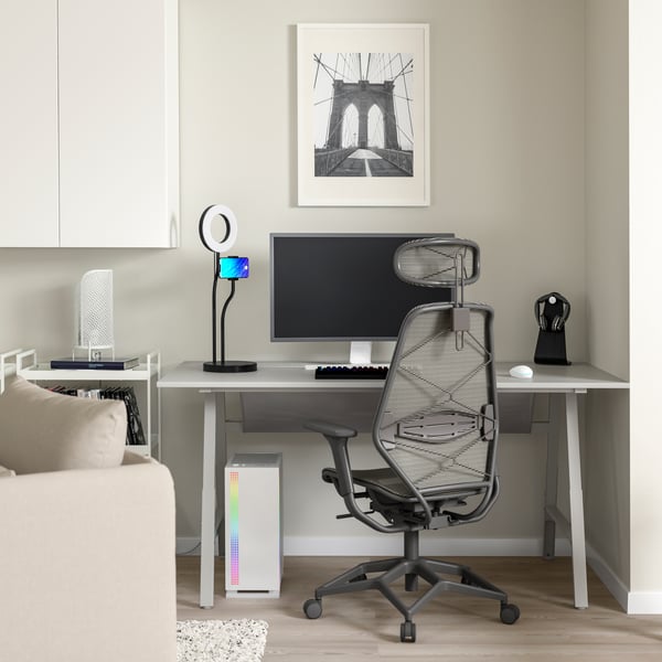 A grey UTESPELARE gaming desk and chair