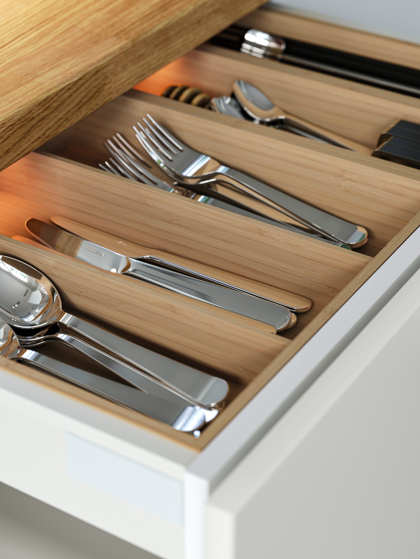 A stainless steel DRAGON 24-piece cutlery set in the kitchen