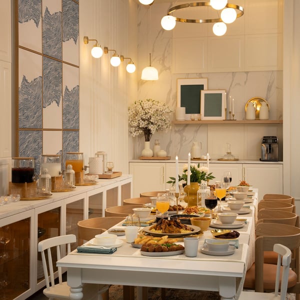 An opal white glass/brass-plated AKTERSPRING pendant lamp