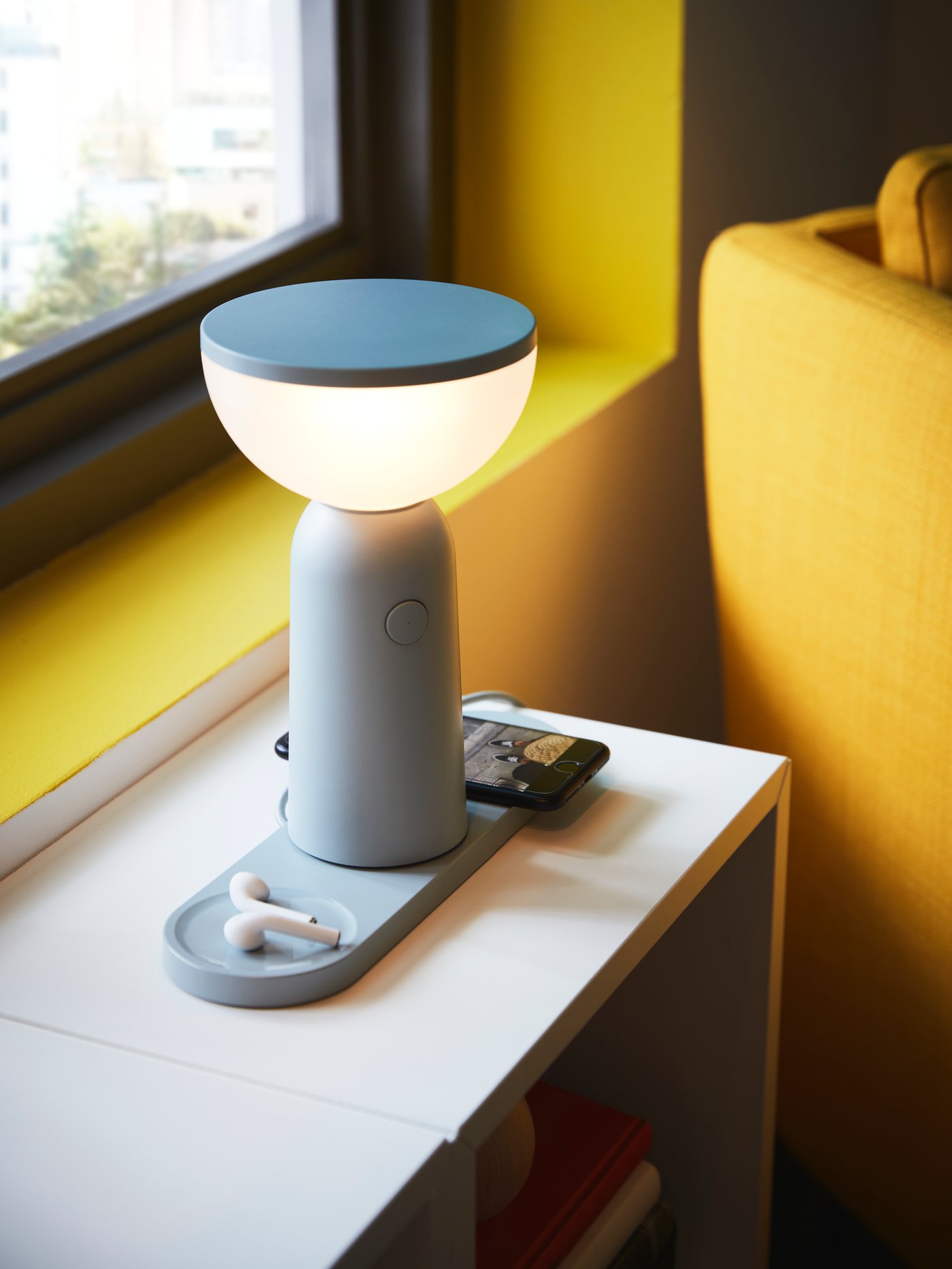 A Skiftebo yellow EKERÖ armchair