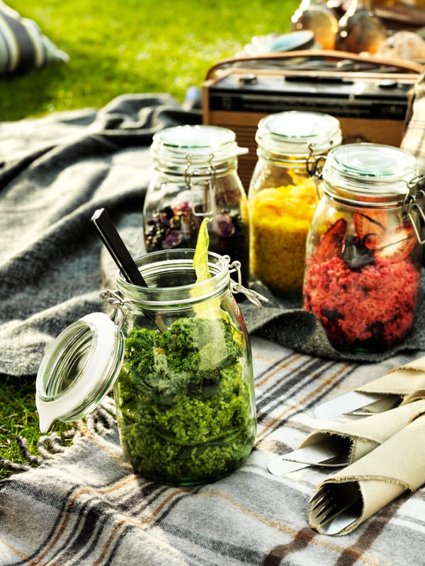 A clear glass KORKEN jar with lid