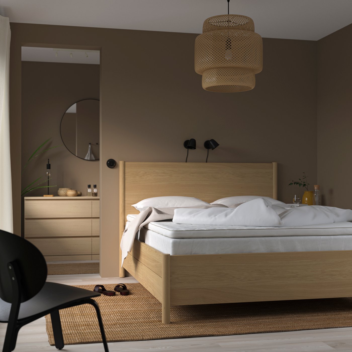 A white NYLÄGET mattress pad