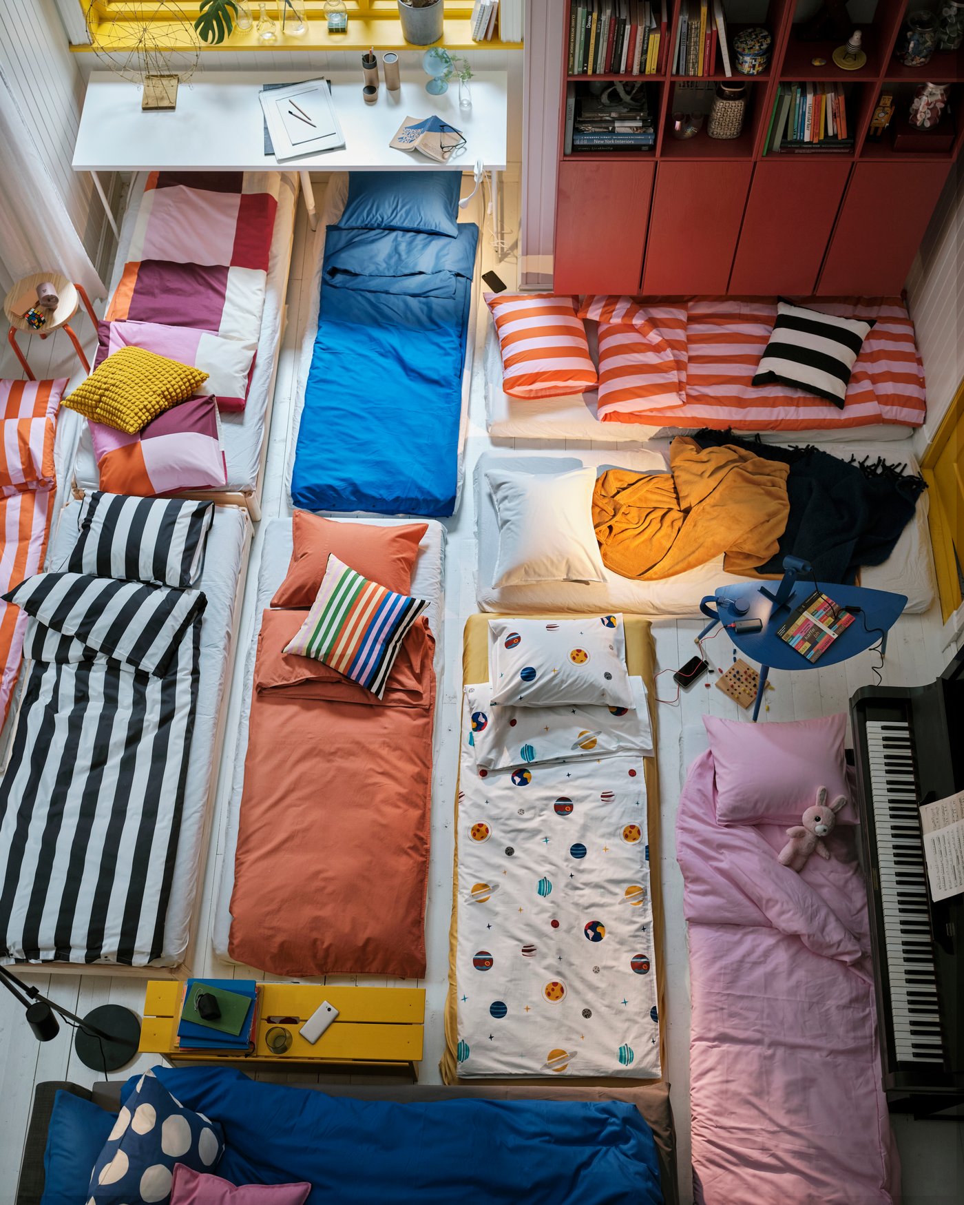 A pine IVAR shelving unit in the living room