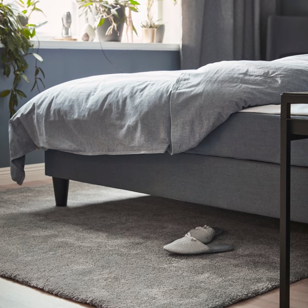 A medium grey STOENSE rug, low pile
