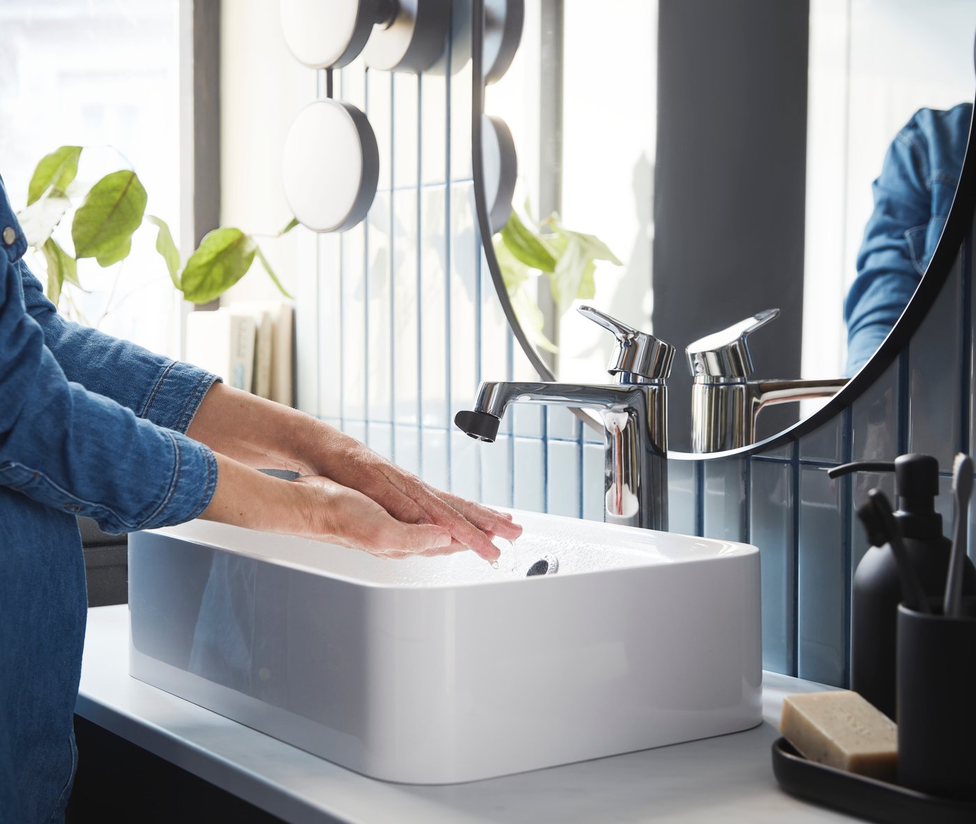 A dimmable matt/black KABOMBA LED wall lamp