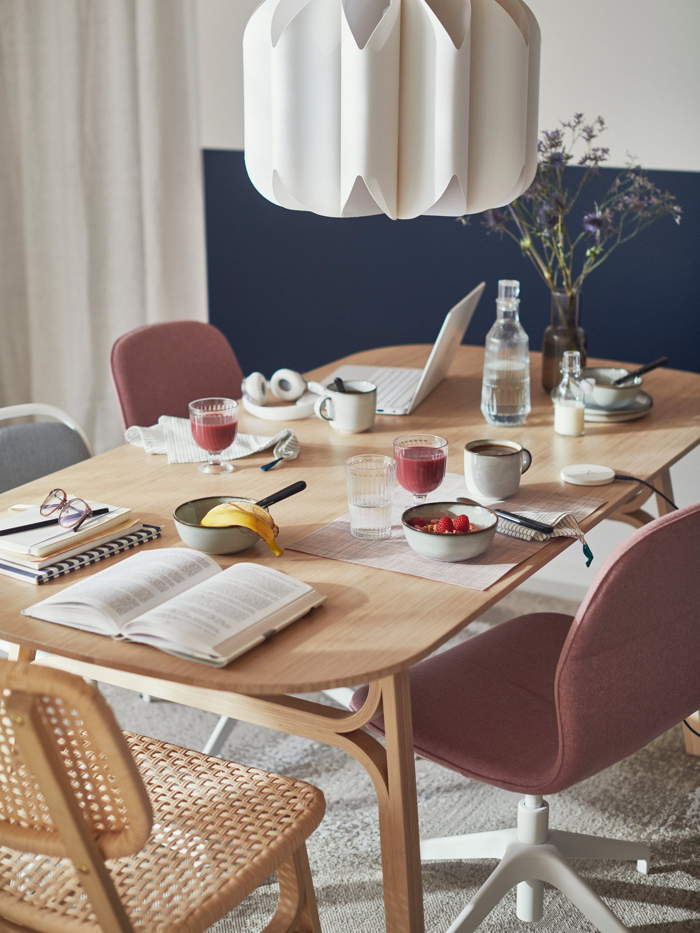 A clear glass KORKEN bottle with stopper