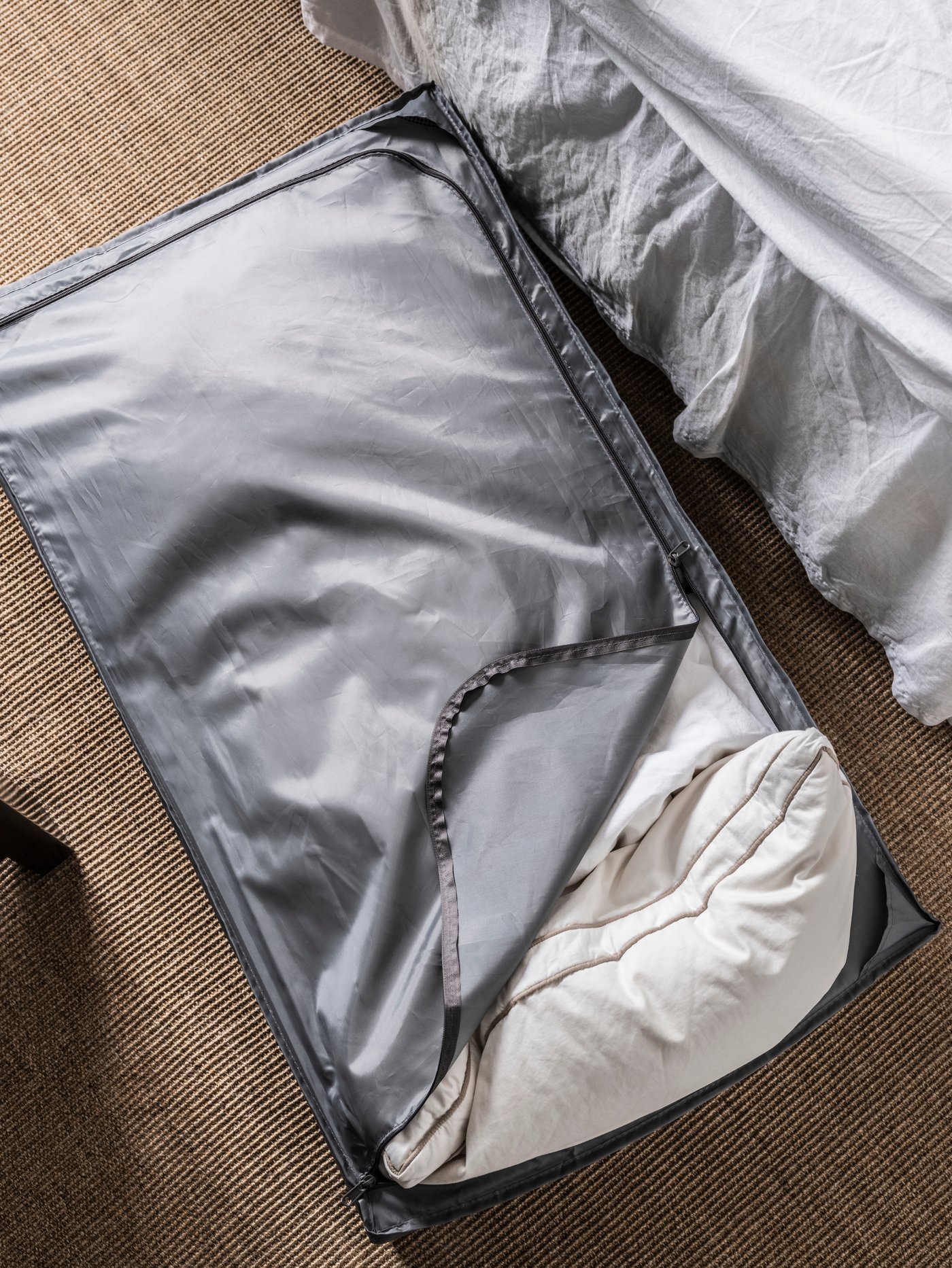 A dark grey SKUBB storage case