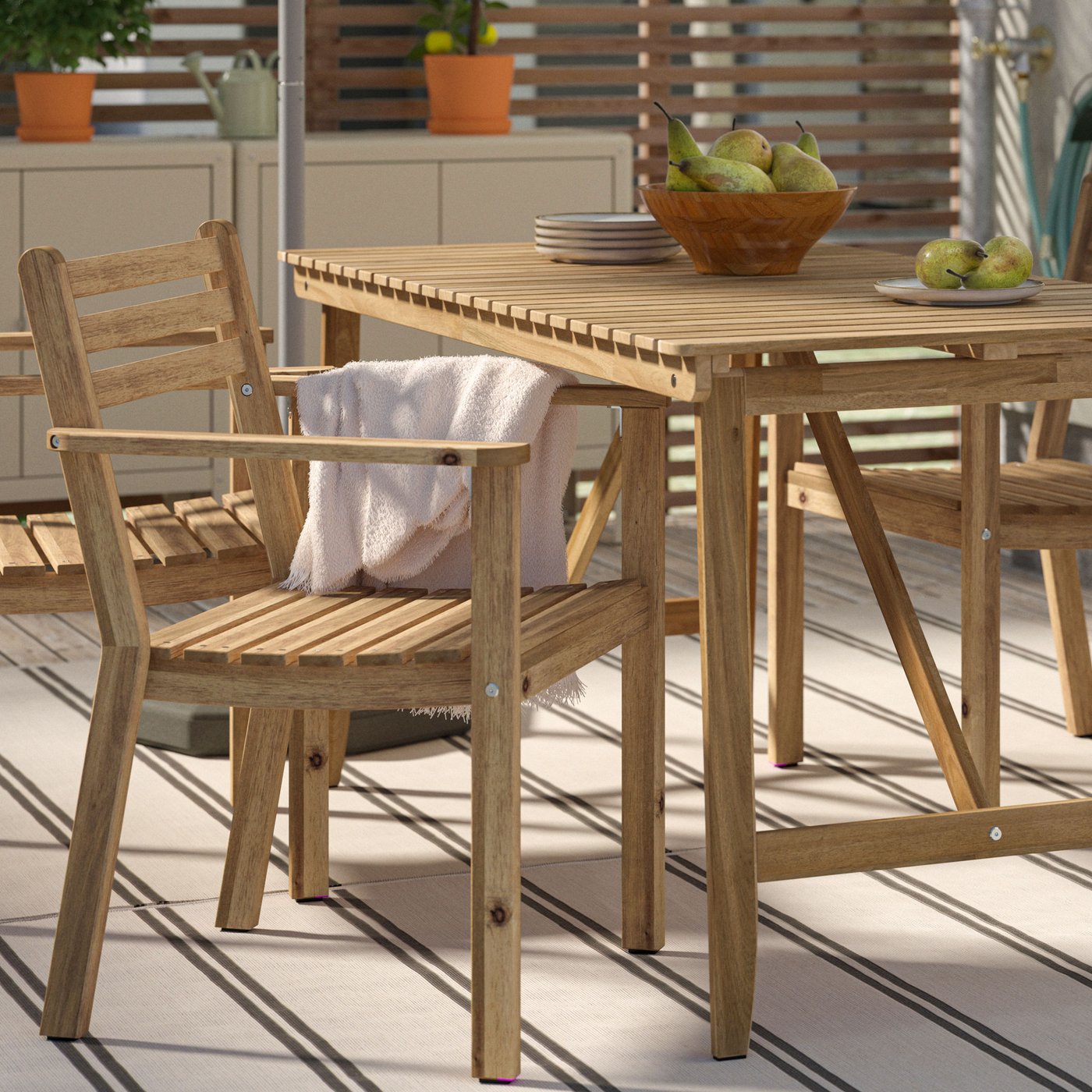 An acacia ASKHOLMEN table, outdoor