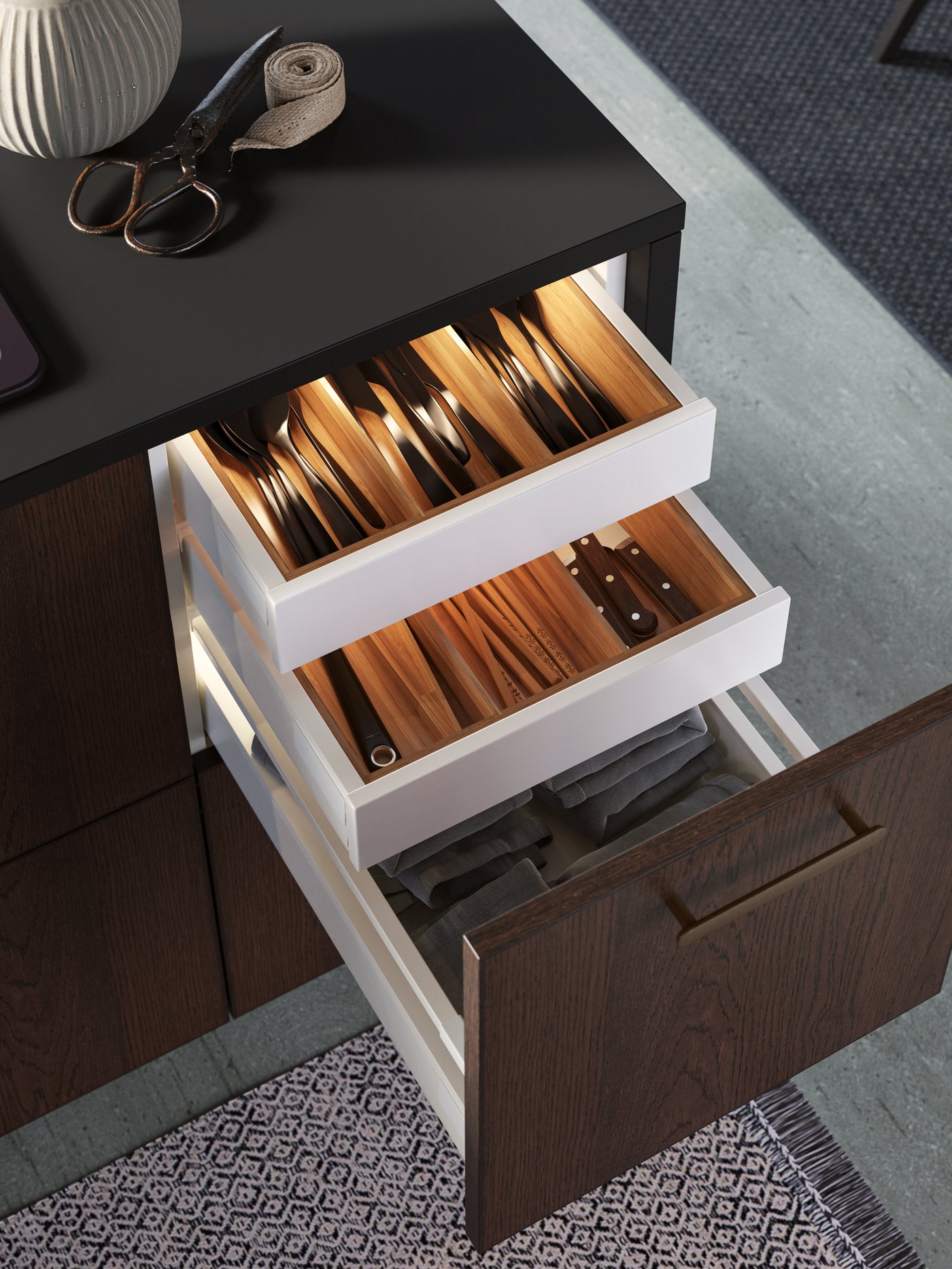 A brown SINARP drawer front in the kitchen