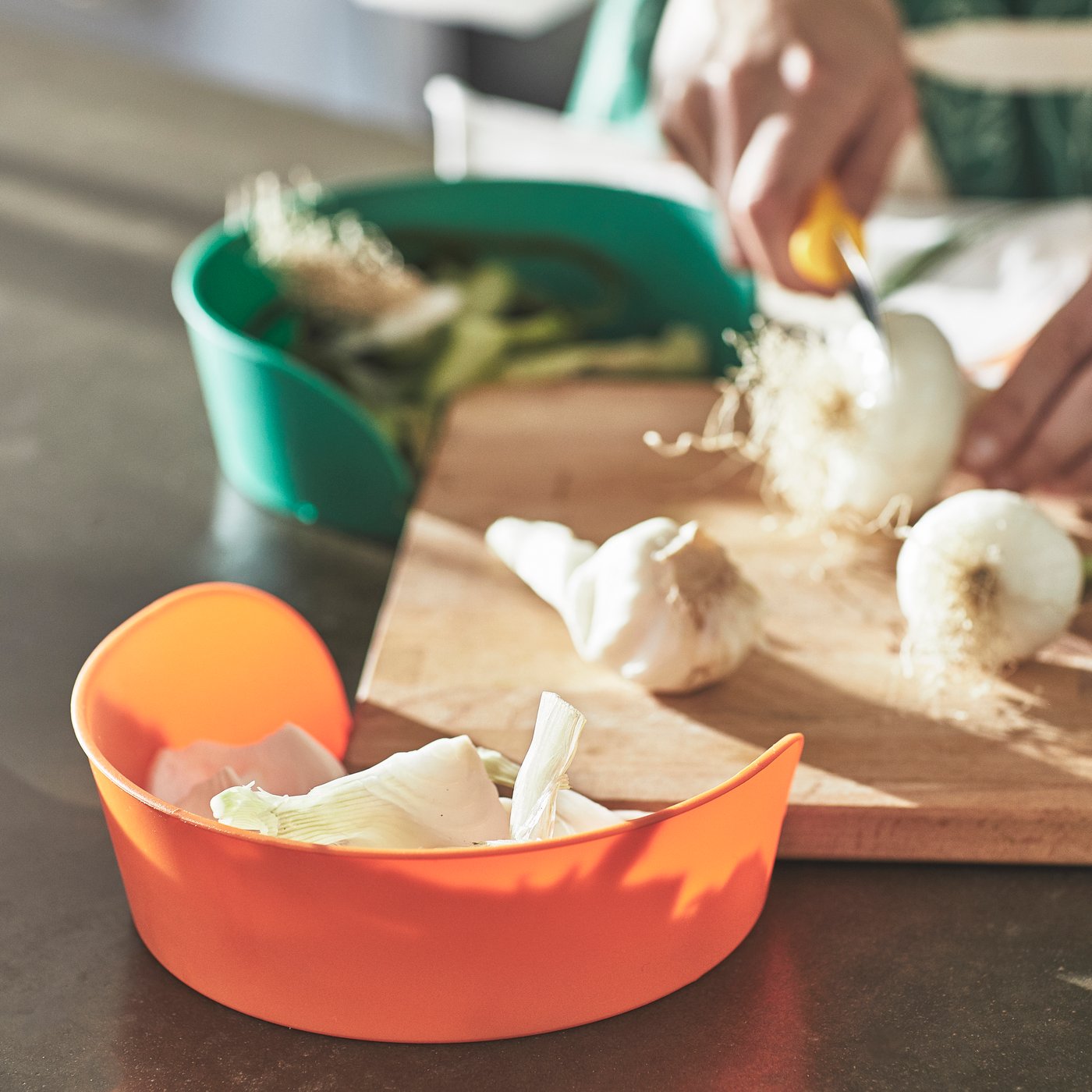 A mixed colours UPPFYLLD preparation bowl
