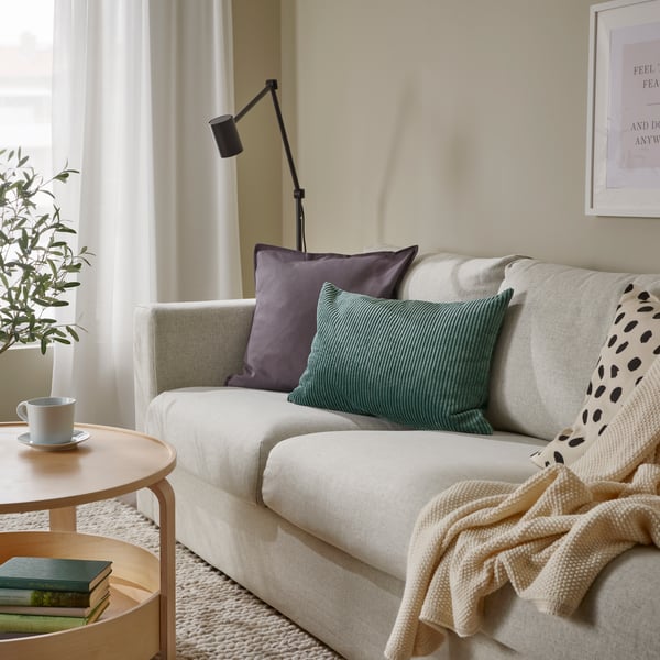 A dark grey-turquoise ÅSVEIG cushion cover